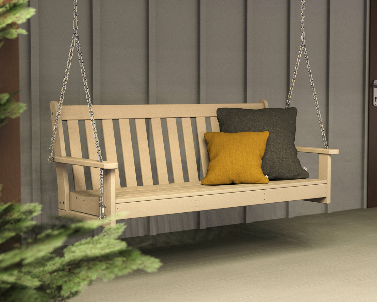 POLYWOOD Vineyard 60" Porch Swing in Sand in an outdoor setting