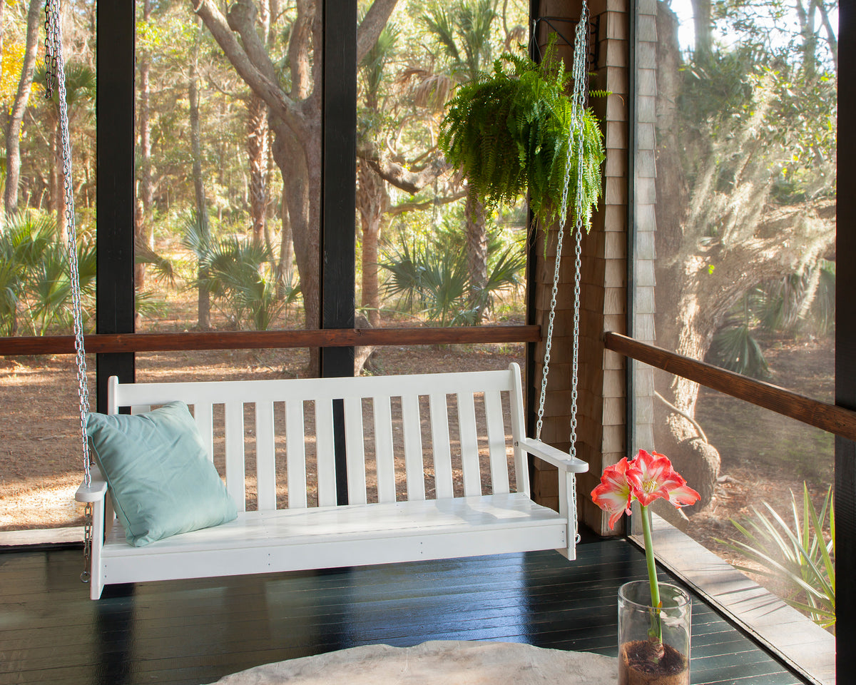 POLYWOOD Vineyard 60" Porch Swing in White in an outdoor setting