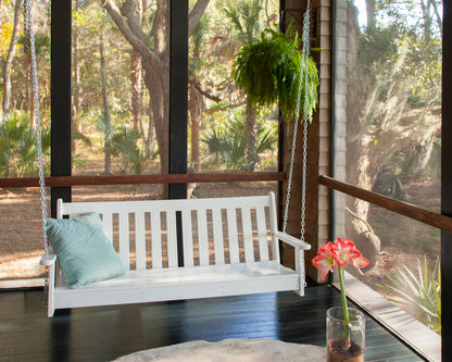 POLYWOOD Vineyard 60" Porch Swing in White in an outdoor setting