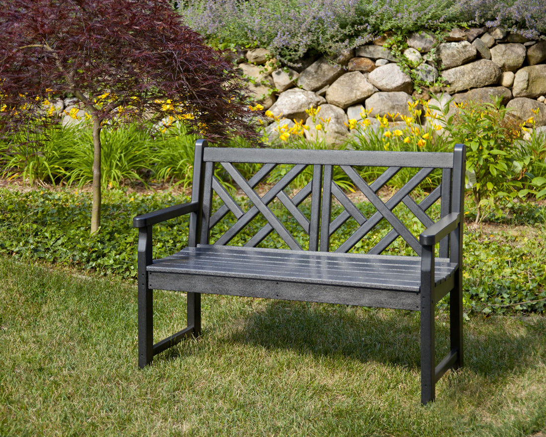 POLYWOOD Chippendale 48" Bench in Black in an outdoor setting