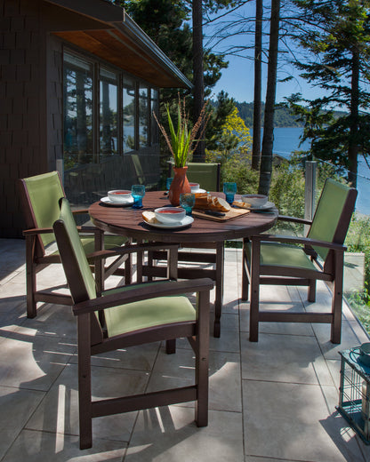 POLYWOOD 48" Round Farmhouse Dining Table styled outdoors