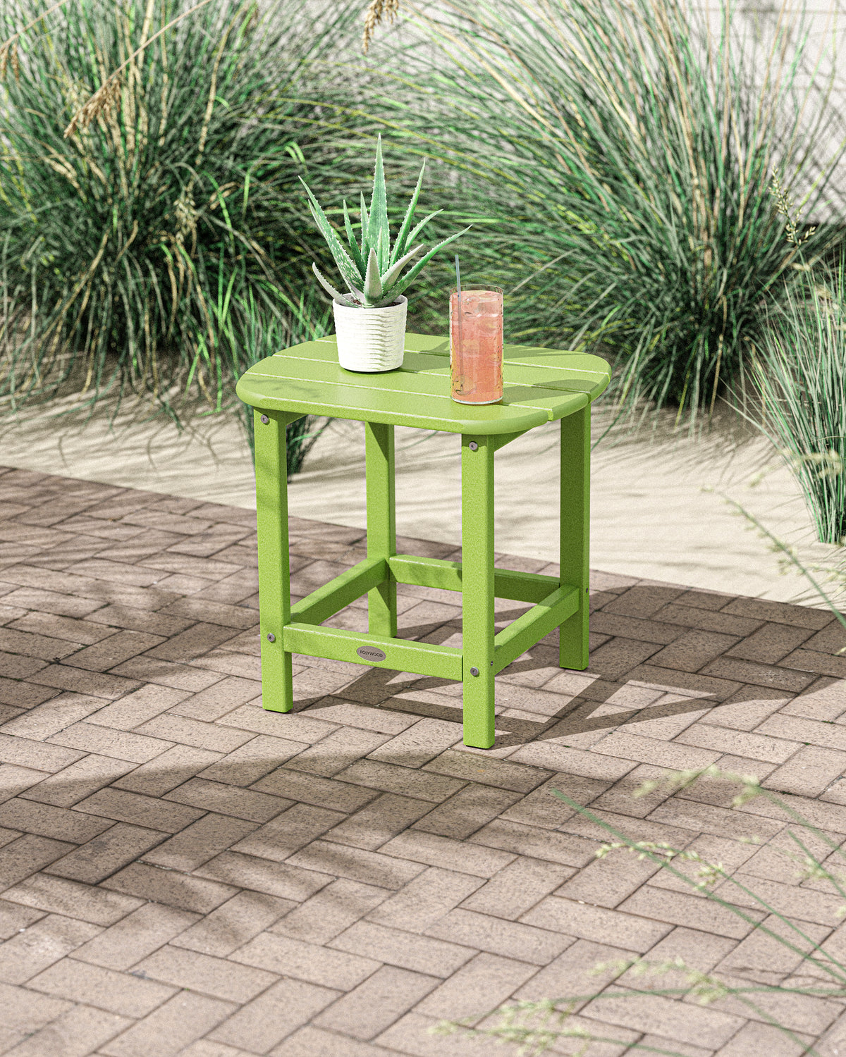 Lifestyle photo of the POLYWOOD South Beach 18" Side Table in Lime