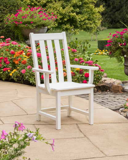 Lifestyle photo of the POLYWOOD Vineyard Dining Arm Chair in White