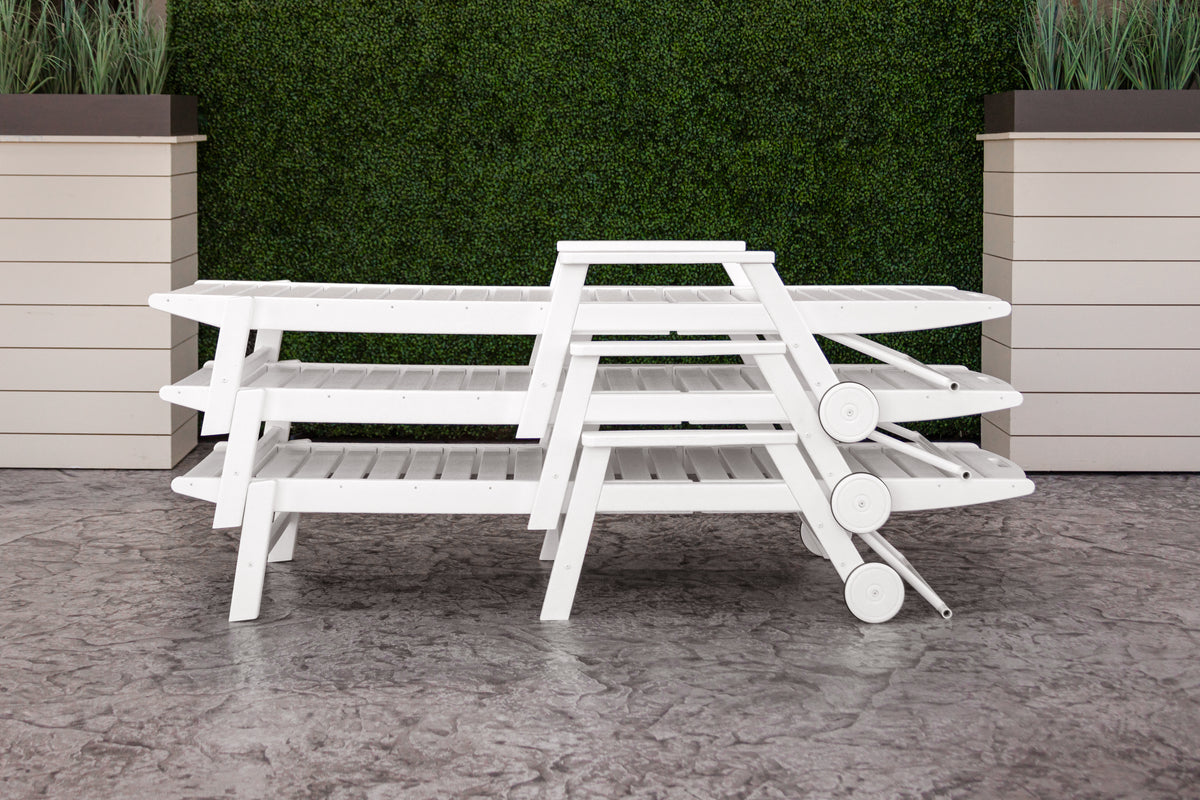 POLYWOOD Nautical Chaise with Arms &amp; Wheels in White styled outdoors