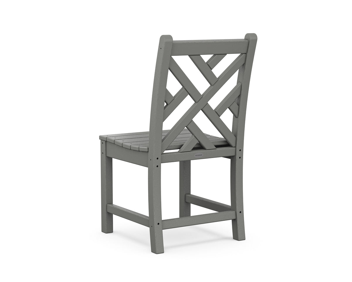 Angled view from the POLYWOOD Chippendale 7-Piece Farmhouse Trestle Dining Set in Slate Grey