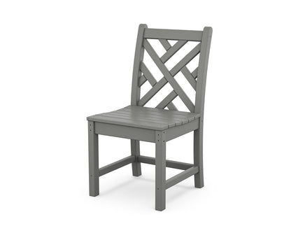 Angled view from the POLYWOOD Chippendale 7-Piece Farmhouse Trestle Dining Set in Slate Grey
