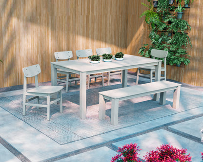 Lifestyle photo of the POLYWOOD Modern Studio Urban Chair 7-Piece Parsons Dining Set with Bench