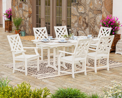 Lifestyle photo of the POLYWOOD Wovendale Arm Chair 7-Piece Farmhouse Dining Set