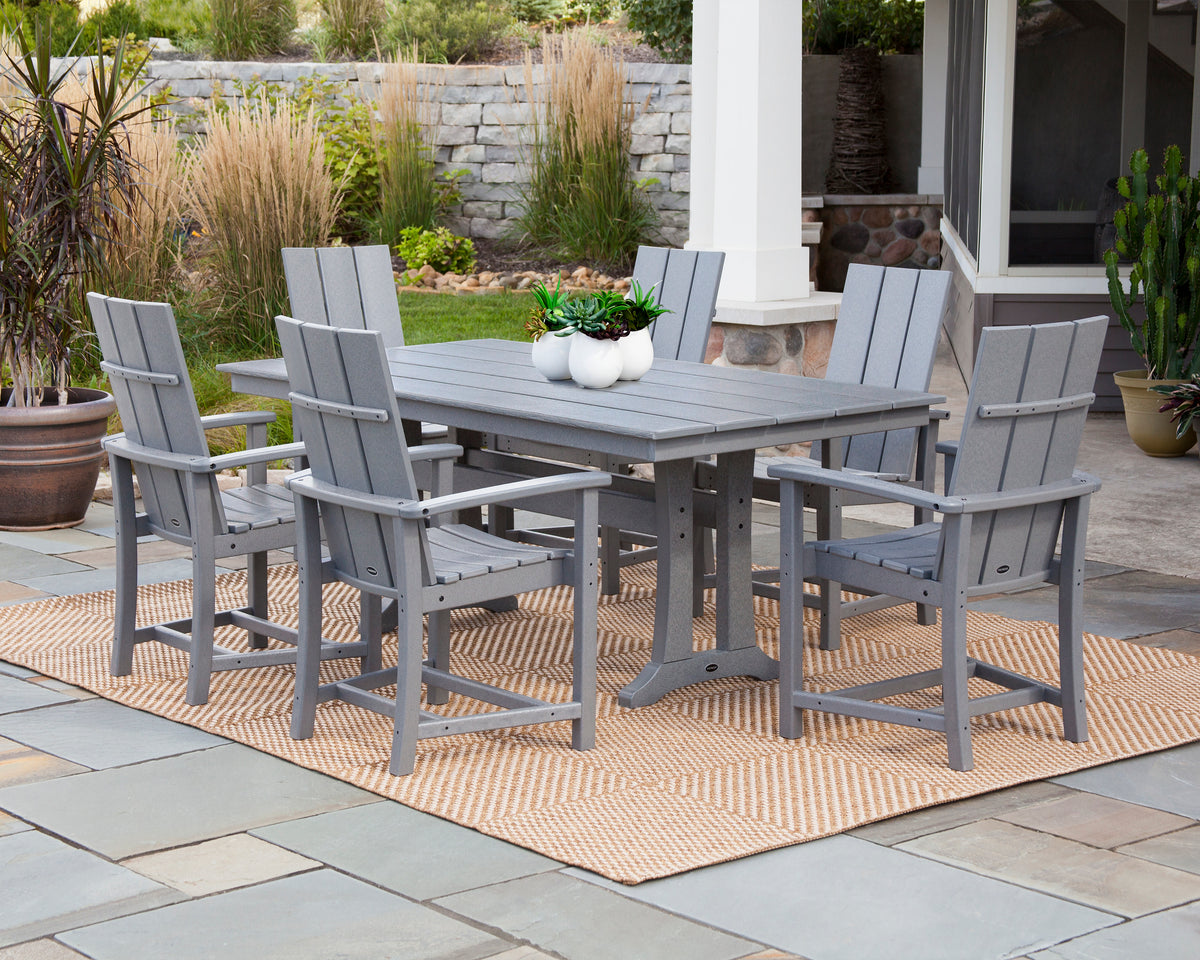 Lifestyle photo of the POLYWOOD Modern Adirondack 7-Piece Farmhouse Dining Set with Trestle Legs