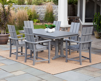 Lifestyle photo of the POLYWOOD Modern Adirondack 7-Piece Farmhouse Dining Set with Trestle Legs