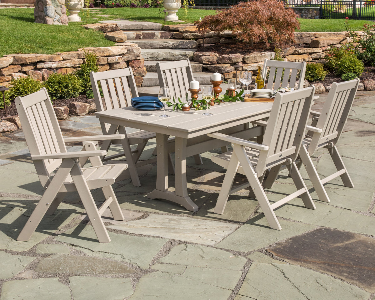 Lifestyle photo of the POLYWOOD Vineyard Folding Chair 7-Piece Farmhouse Dining Set with Trestle Legs