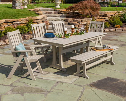 Lifestyle photo of the POLYWOOD Vineyard 6-Piece Folding Chair Farmhouse Dining Set with Trestle Legs and Bench