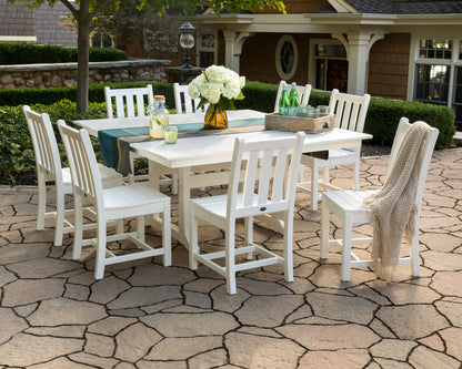 Lifestyle photo of the POLYWOOD Traditional Garden 9-Piece Farmhouse Trestle Dining Set