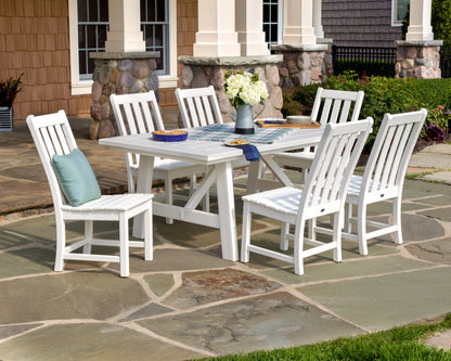 Lifestyle photo of the POLYWOOD Vineyard 7-Piece Rustic Farmhouse Side Chair Dining Set