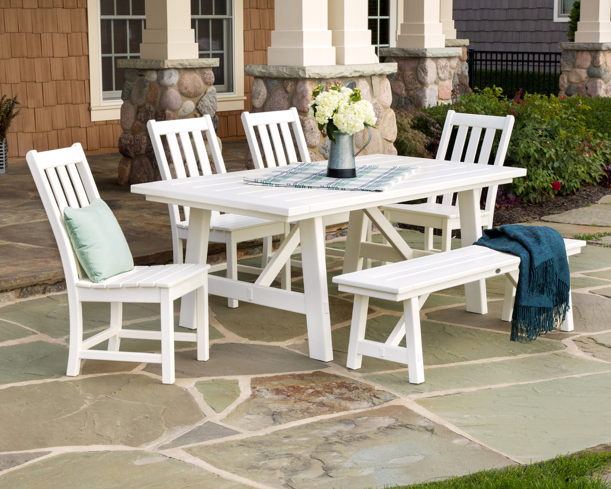 Lifestyle photo of the POLYWOOD Vineyard 6-Piece Rustic Farmhouse Side Chair Dining Set with Bench