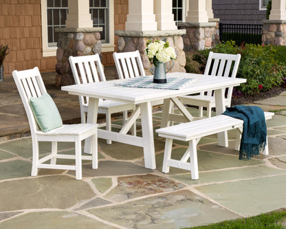 Lifestyle photo of the POLYWOOD Vineyard 6-Piece Rustic Farmhouse Side Chair Dining Set with Bench