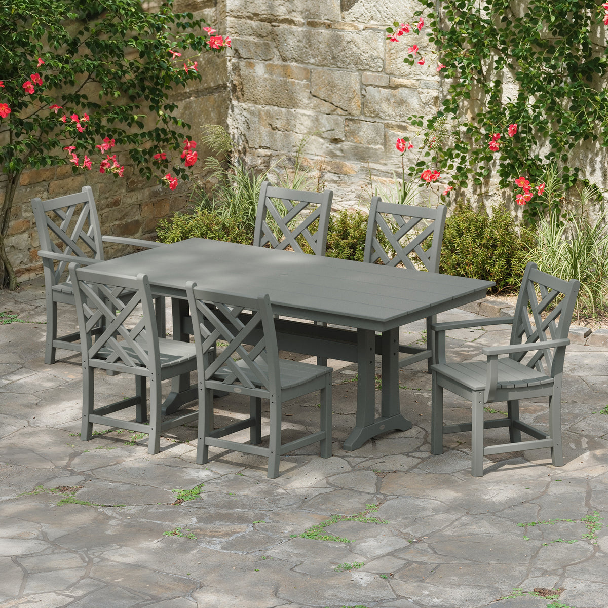 Lifestyle photo of the POLYWOOD Chippendale 7-Piece Farmhouse Trestle Dining Set