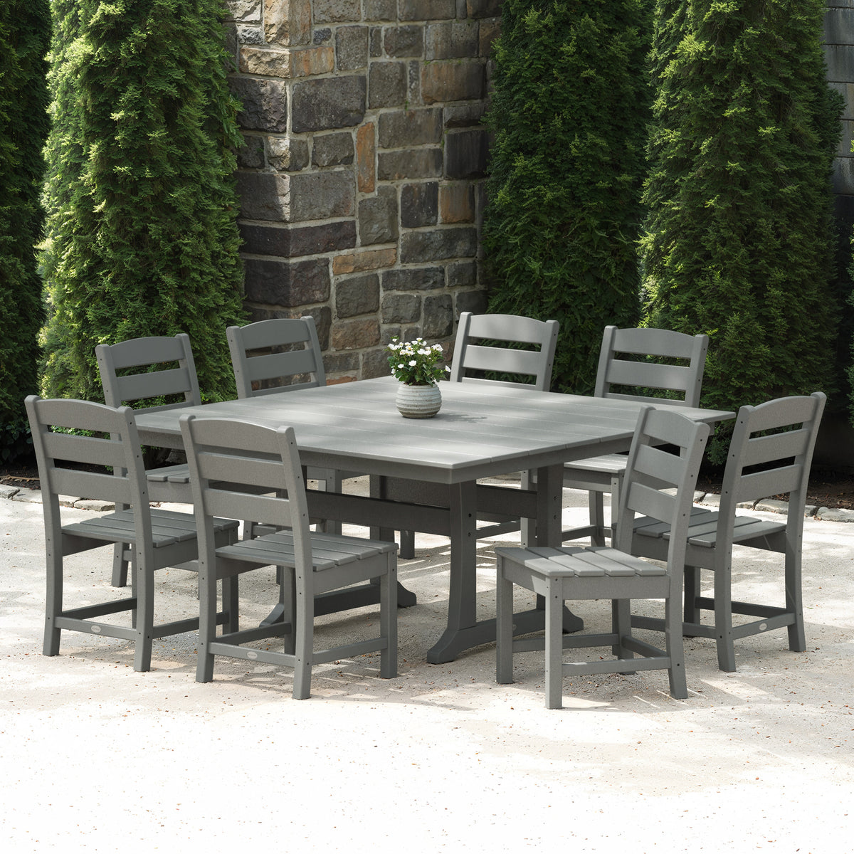 Lifestyle photo of the POLYWOOD Lakeside 9-Piece Farmhouse Trestle Dining Set