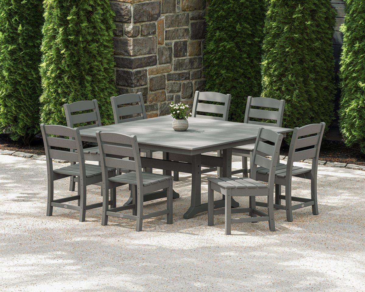 Lifestyle photo of the POLYWOOD Lakeside 9-Piece Farmhouse Trestle Dining Set