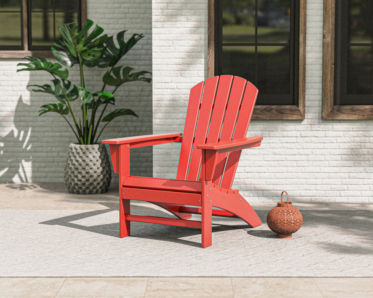 POLYWOOD Nautical Adirondack Chair in Sunset Red in an outdoor setting