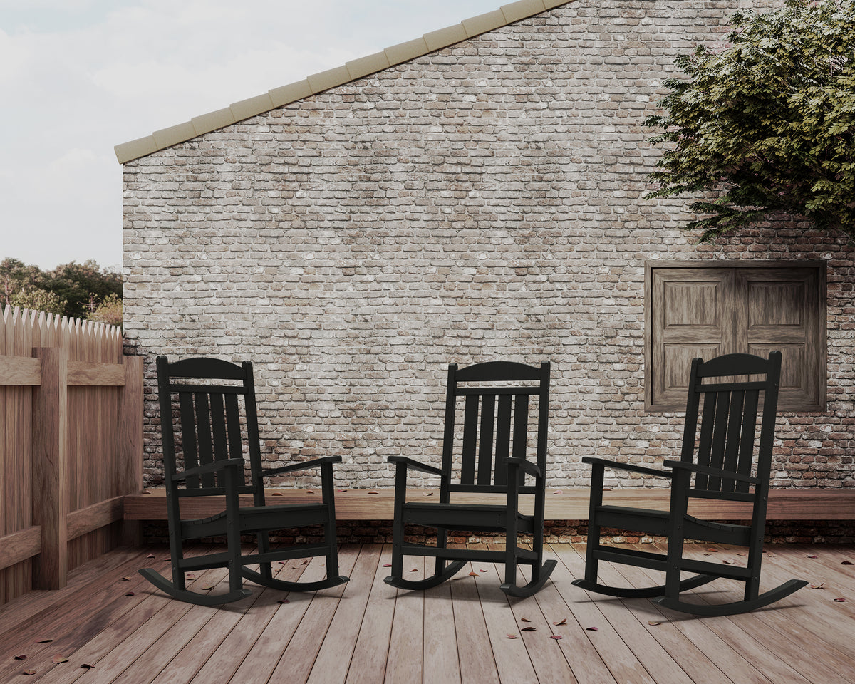 POLYWOOD Presidential Rocking Chair in Black in an outdoor setting