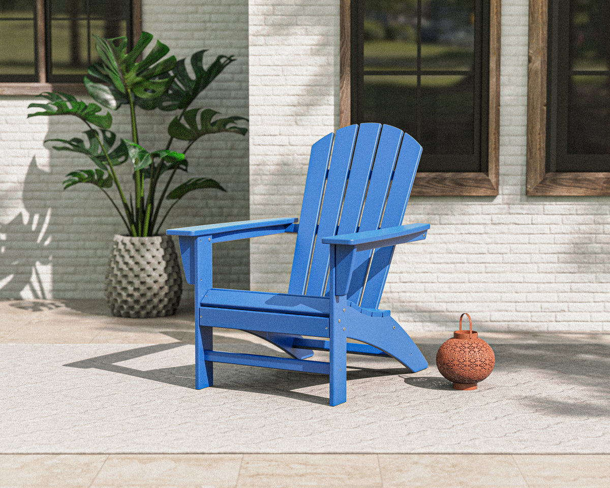 Lifestyle photo of the POLYWOOD Nautical Adirondack Chair in Pacific Blue