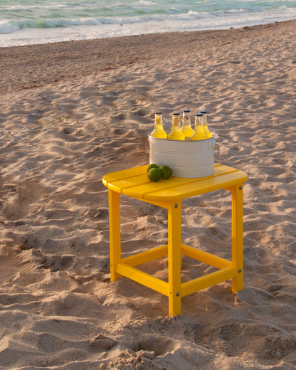 POLYWOOD South Beach 18" Side Table in Lemon in an outdoor setting