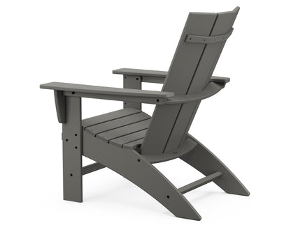 Angled view of the POLYWOOD Modern Curveback Adirondack Chair in Slate Grey