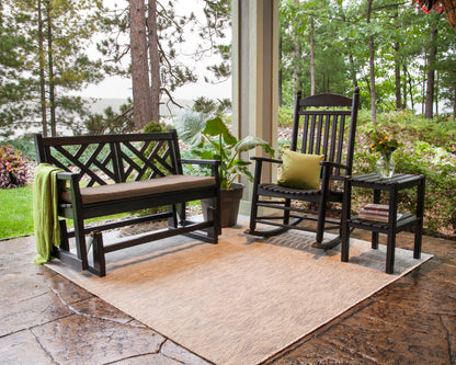 POLYWOOD Chippendale 48" Glider in Black in an outdoor setting
