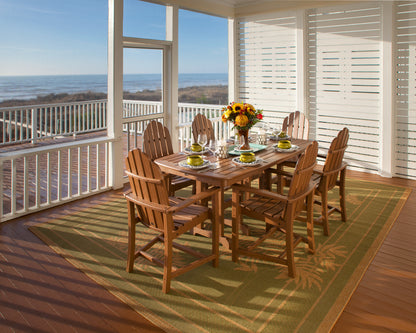Lifestyle photo of the POLYWOOD Classic Adirondack Dining Chair in Teak