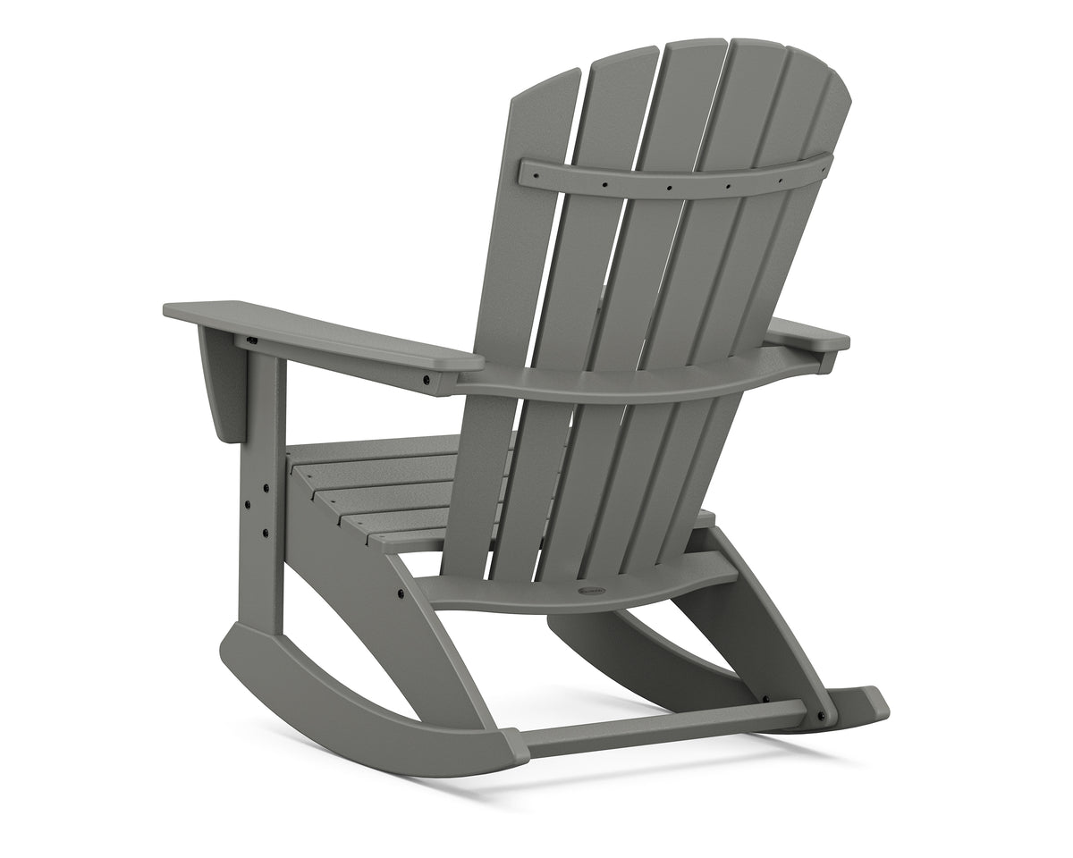 Angled view of the POLYWOOD Nautical Curveback Adirondack Rocking Chair in Slate Grey