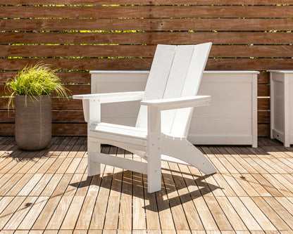 POLYWOOD Modern Grand Adirondack Chair in White in an outdoor setting