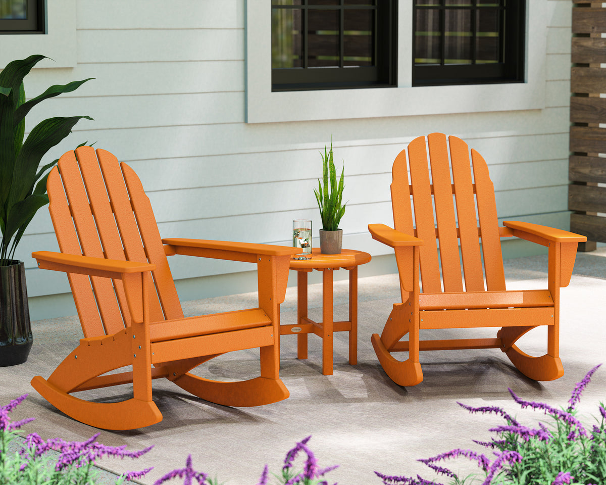 POLYWOOD Vineyard 3-Piece Adirondack Rocking Chair Set with 18" Round Table in Tangerine in an outdoor setting