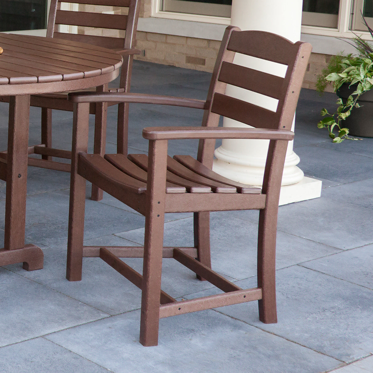 POLYWOOD La Casa Café Dining Arm Chair in Teak styled outdoors