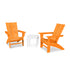 Two orange Adirondack chairs with a white table on a white background