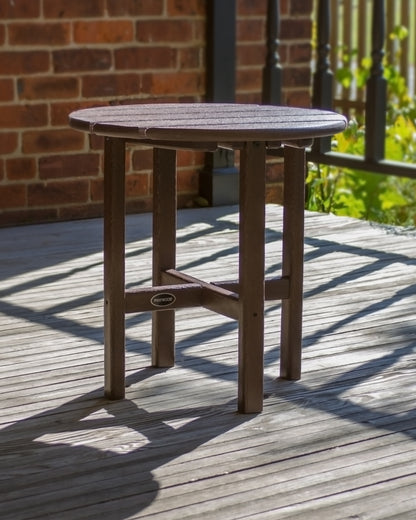 POLYWOOD Round 18" Side Table in Mahogany in an outdoor setting