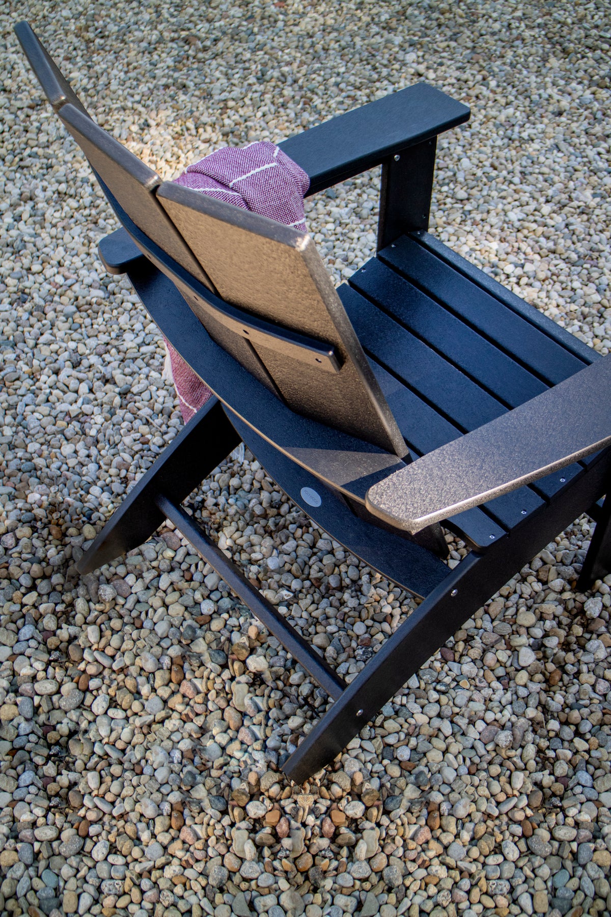 Product detail of the POLYWOOD Modern Curveback Adirondack Chair in Black