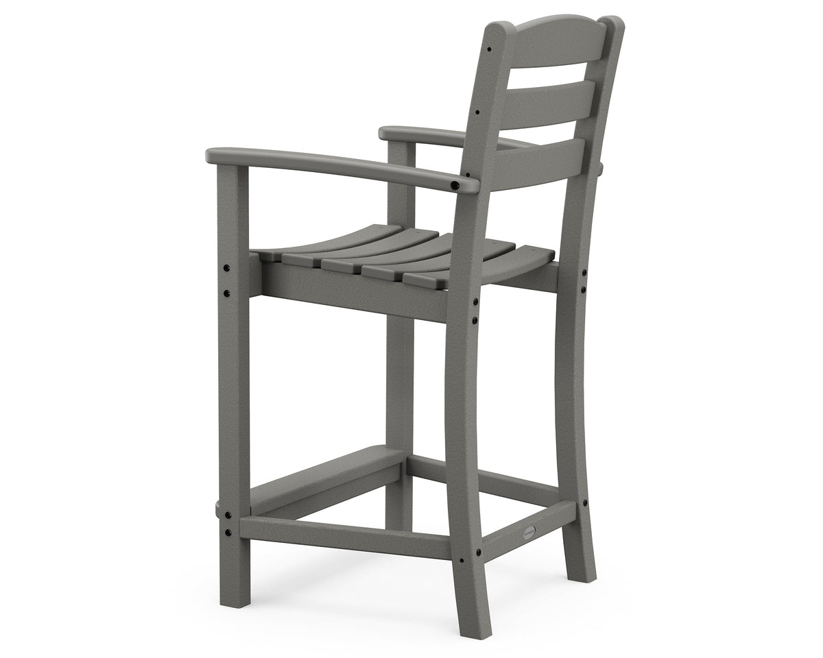 Angled view of the POLYWOOD La Casa Café Counter Arm Chair in Slate Grey