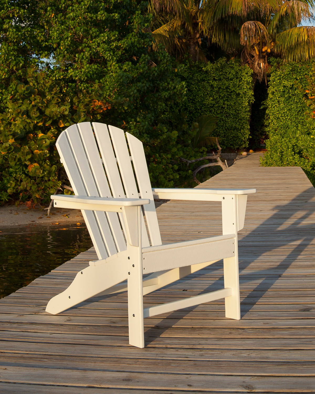 Lifestyle photo of the POLYWOOD South Beach Adirondack in White (2)