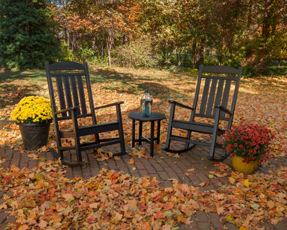 POLYWOOD Presidential 3-Piece Rocker Set with Round Side Table in Black in an outdoor setting