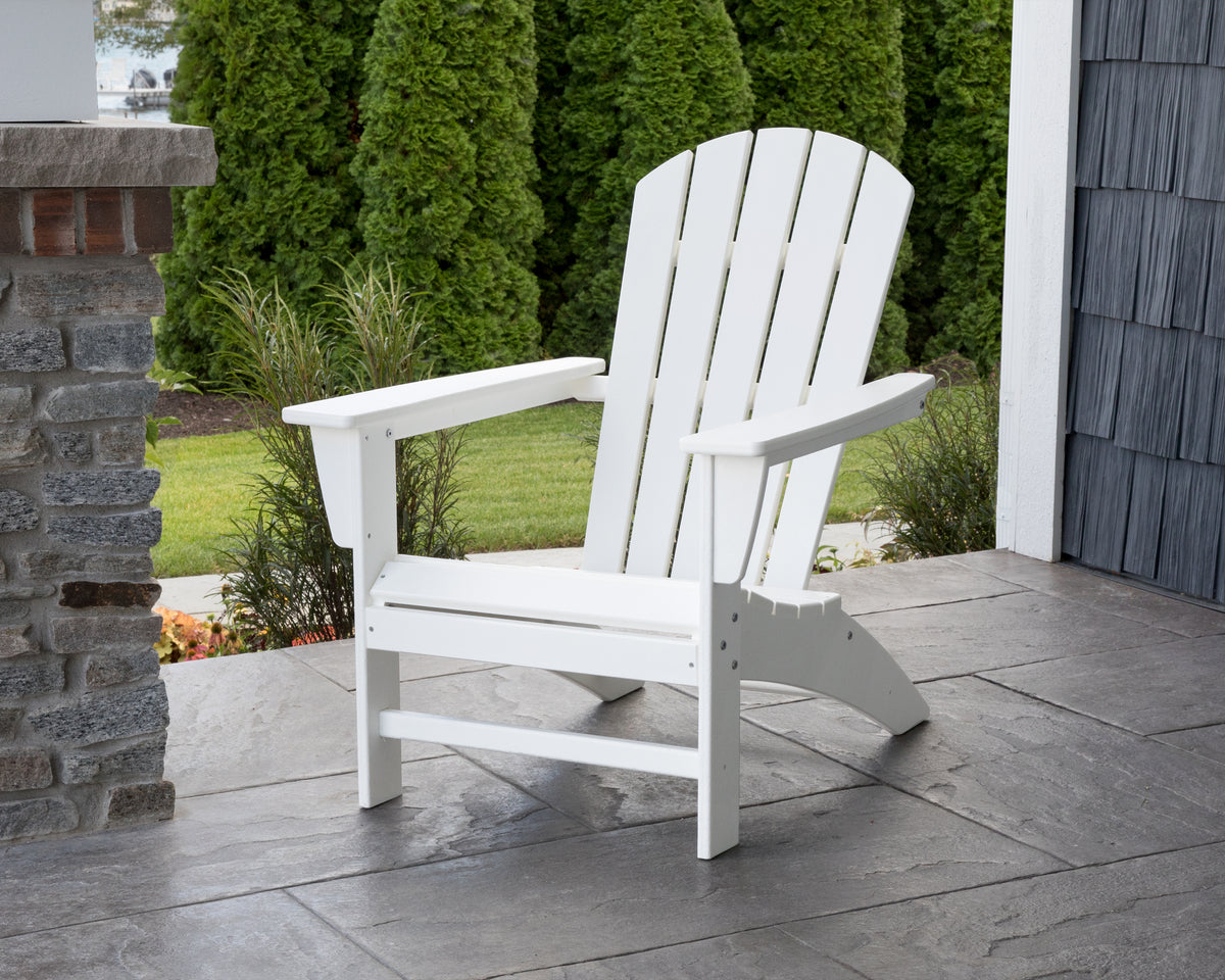 Lifestyle photo of the POLYWOOD Nautical Adirondack Chair in White