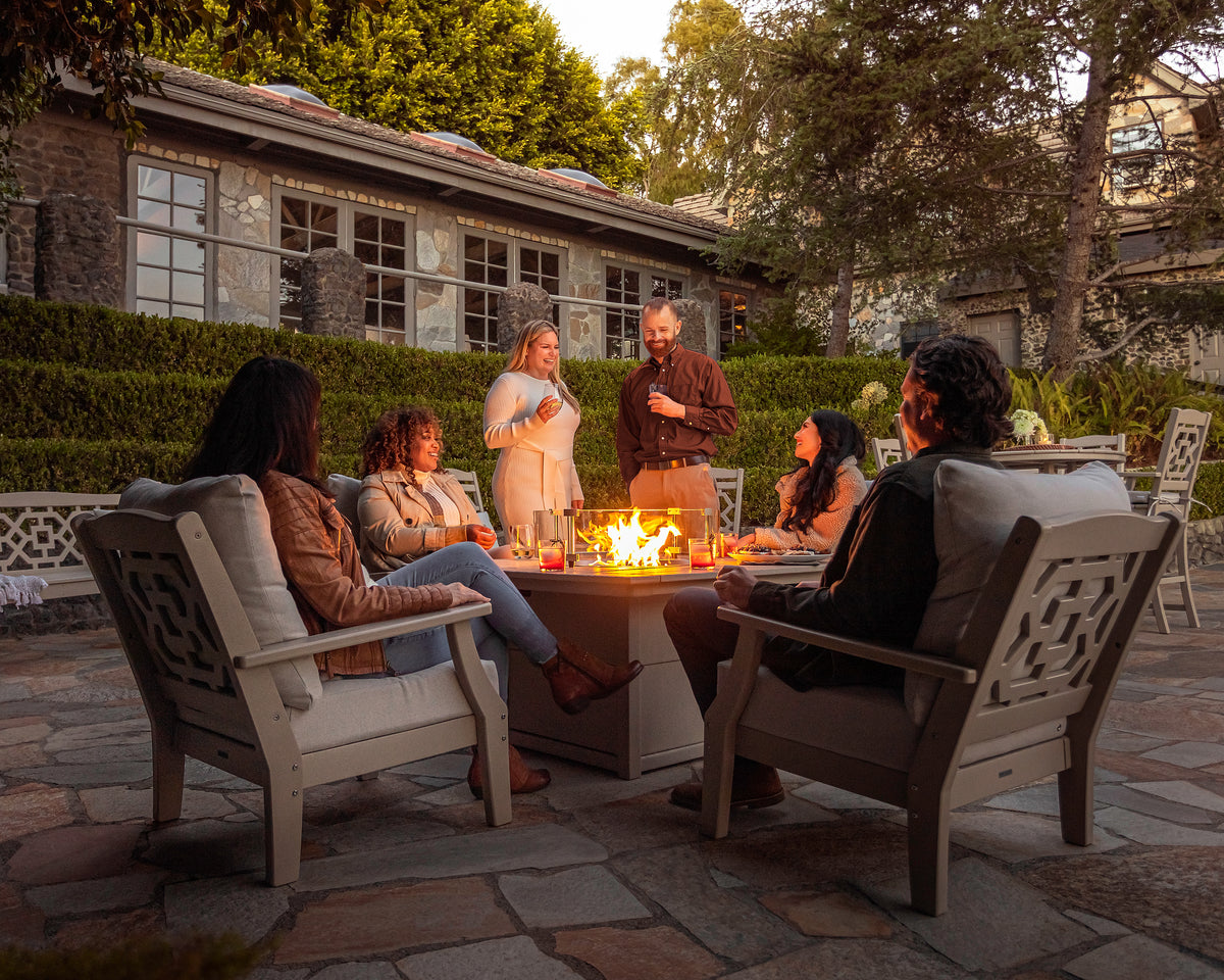 Lifestyle photo of the POLYWOOD Square 42" Fire Pit Table
