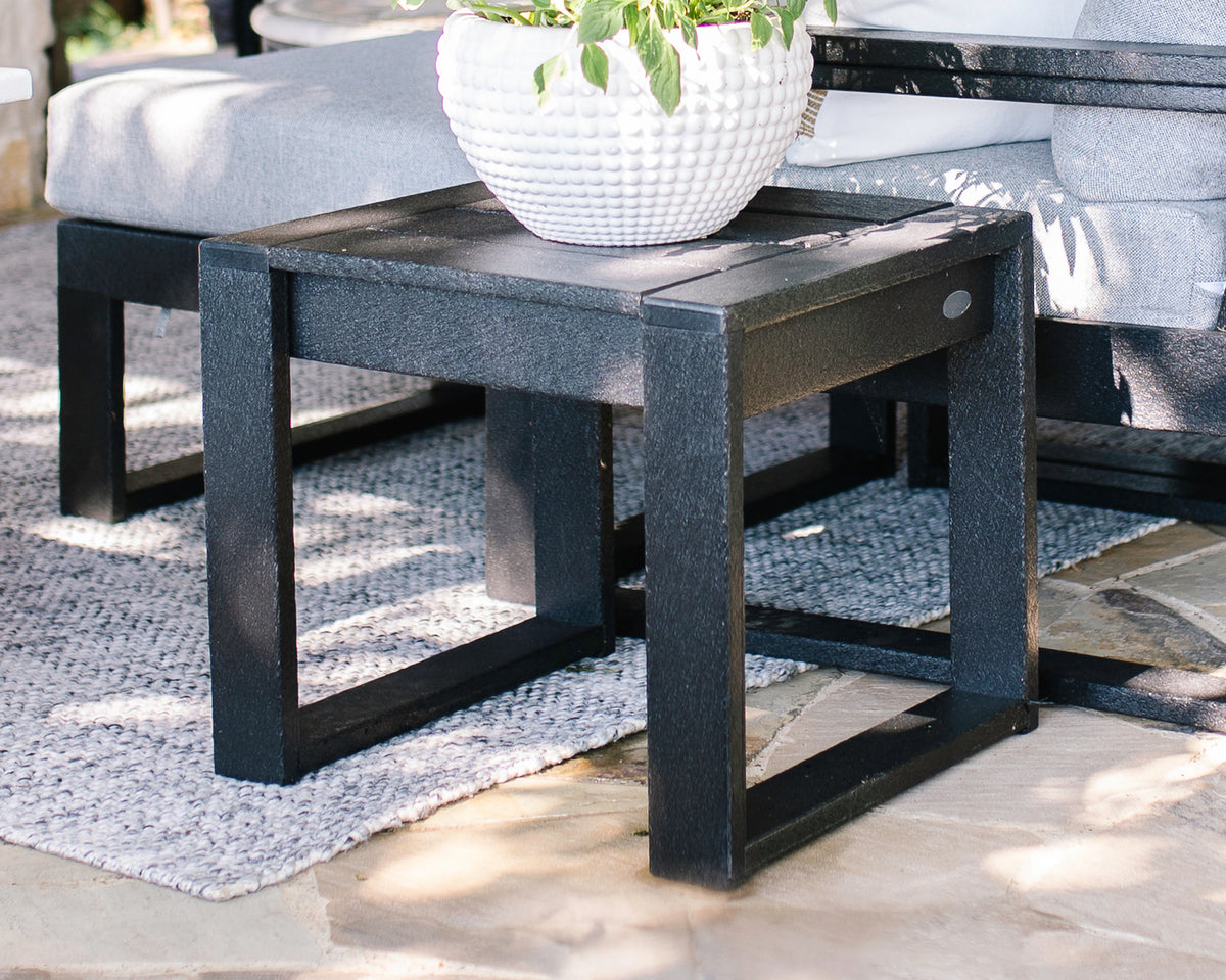 POLYWOOD EDGE End Table in Black in an outdoor setting
