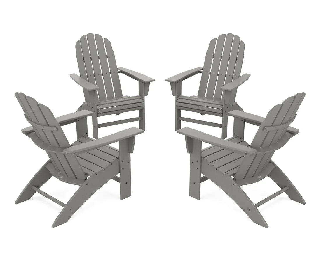 Four gray Adirondack chairs arranged in a circle on a white background