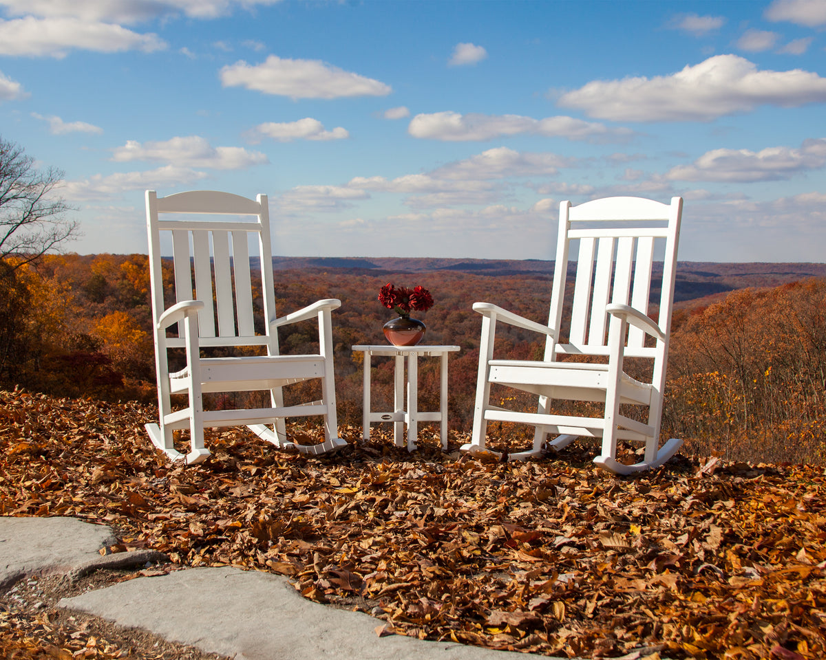 Lifestyle photo of the POLYWOOD Presidential 3-Piece Rocker Set with Round Side Table in White