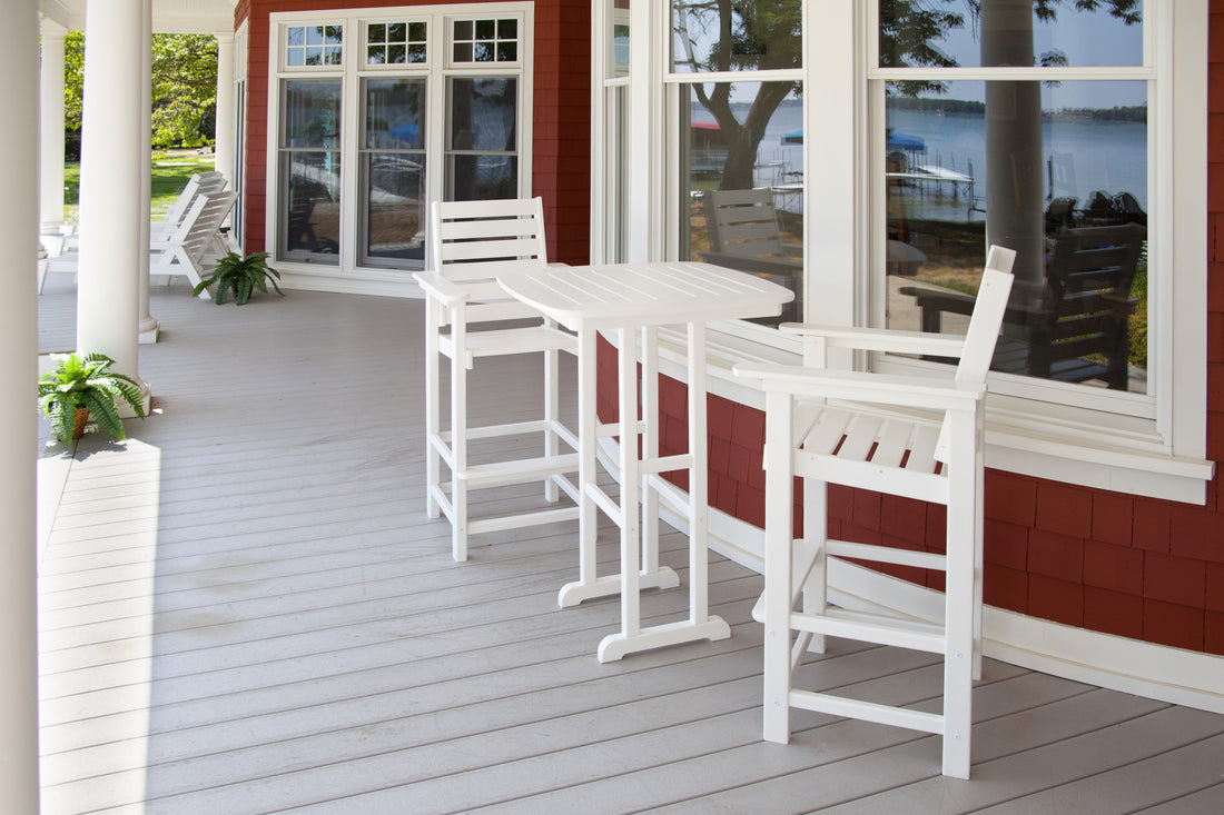 POLYWOOD Captain Bar Chair in White in an outdoor setting