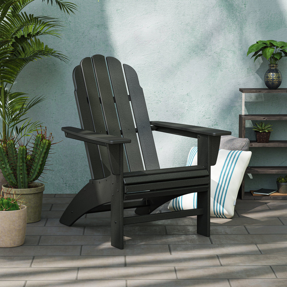 POLYWOOD Vineyard Curveback Adirondack Chair in Black styled outdoors