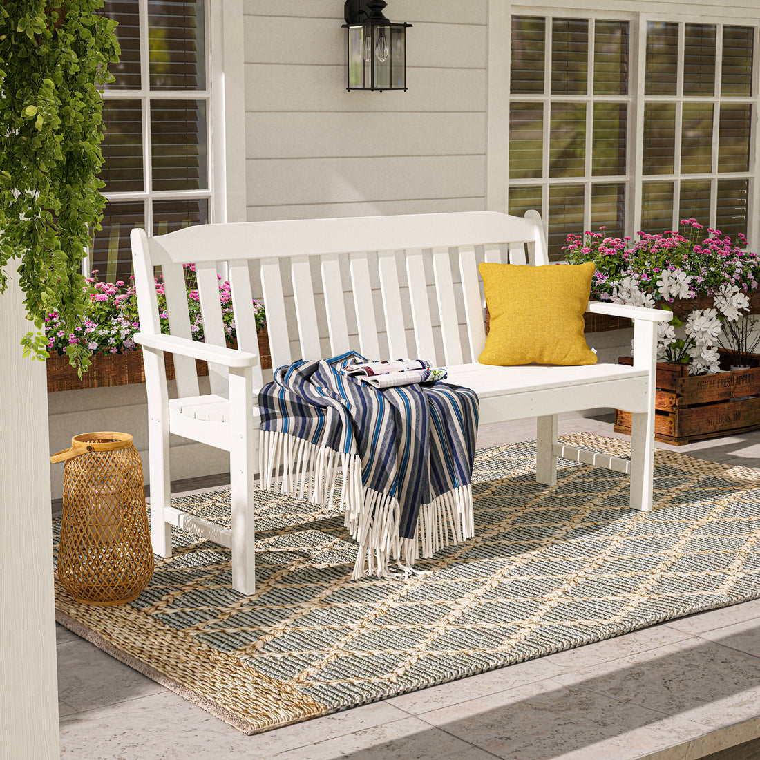POLYWOOD Country Living 60" Garden Bench in White in an outdoor setting