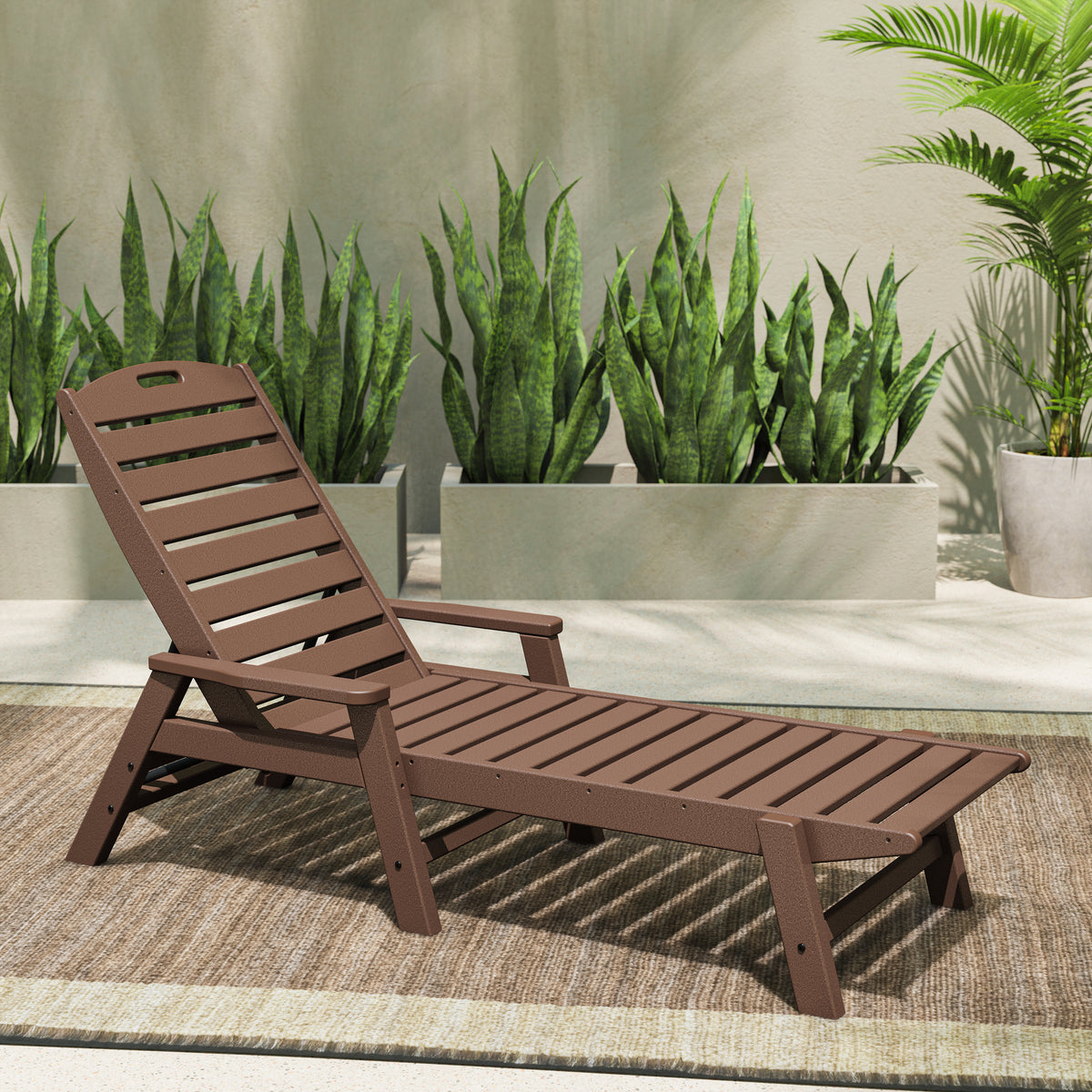 Lifestyle photo of the POLYWOOD Nautical Chaise with Arms in Mahogany