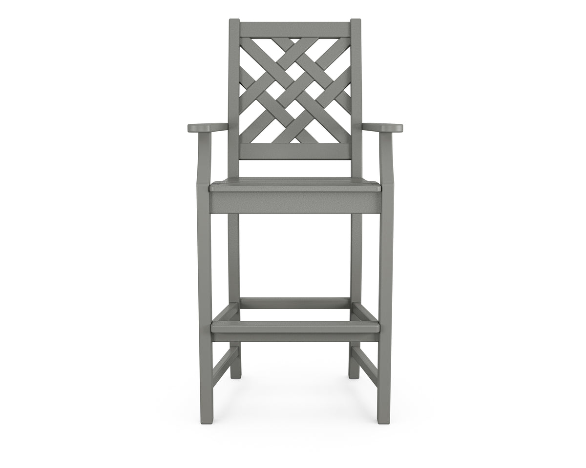Angled view of the POLYWOOD Wovendale Bar Arm Chair in Slate Grey